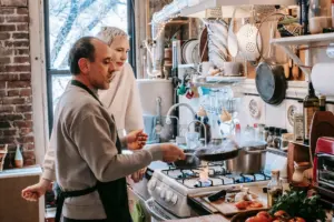 Family cooking together in a bright kitchen
