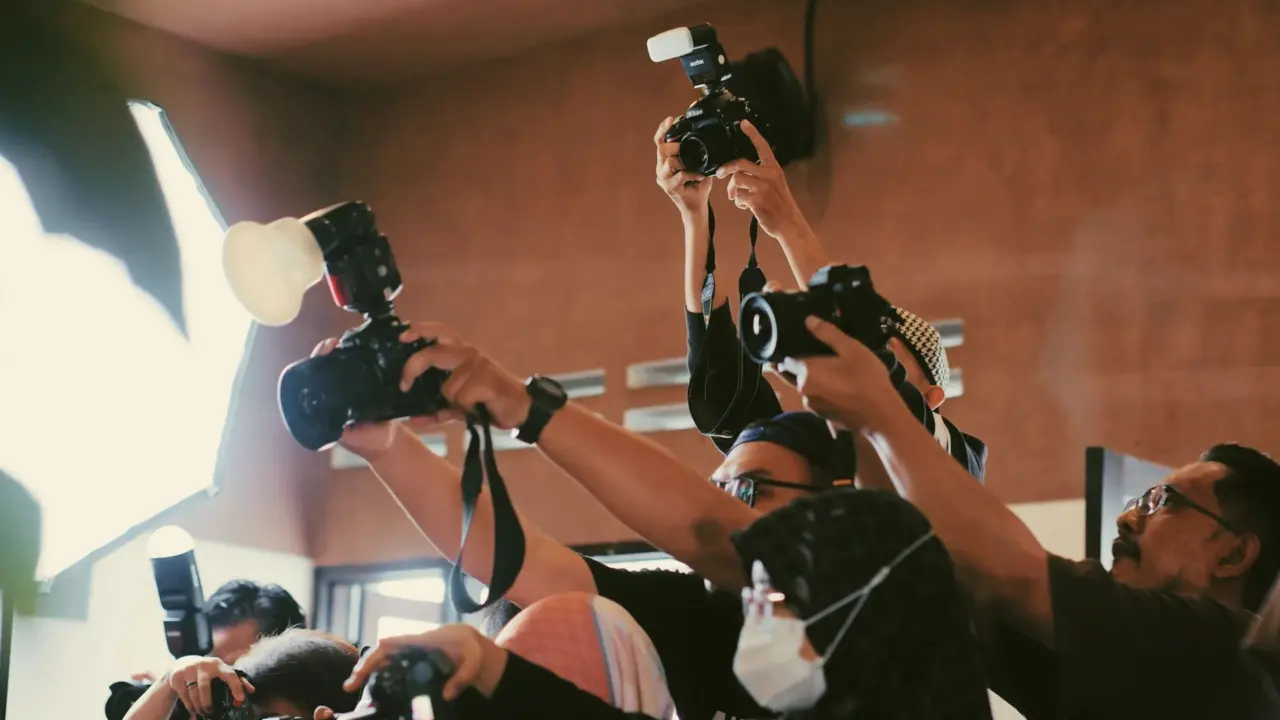 Photographers at a red carpet event